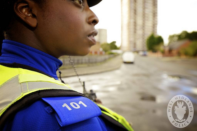 Police woman in inner city area